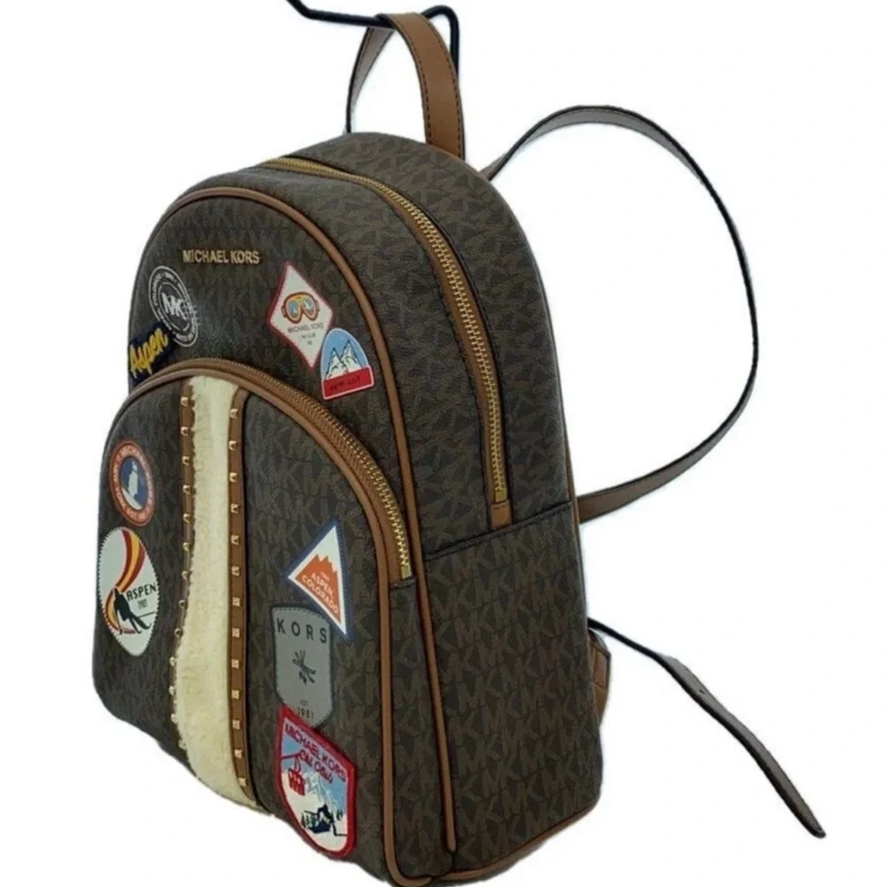 Michael Kors Brown Backpack with Aspen patches sherpa detail like new (RARE)